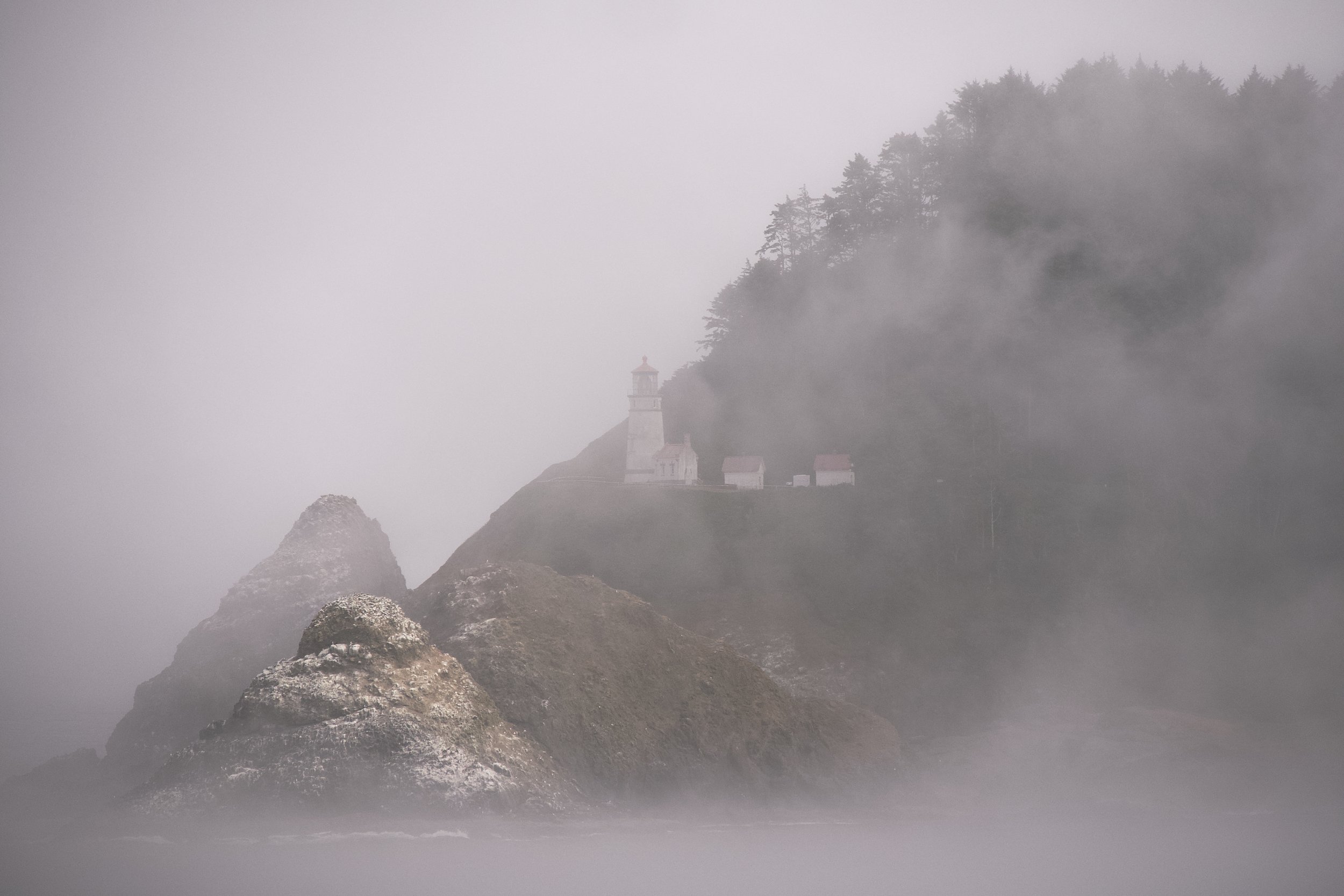 Heceta Head Lighthouse coming out of fog