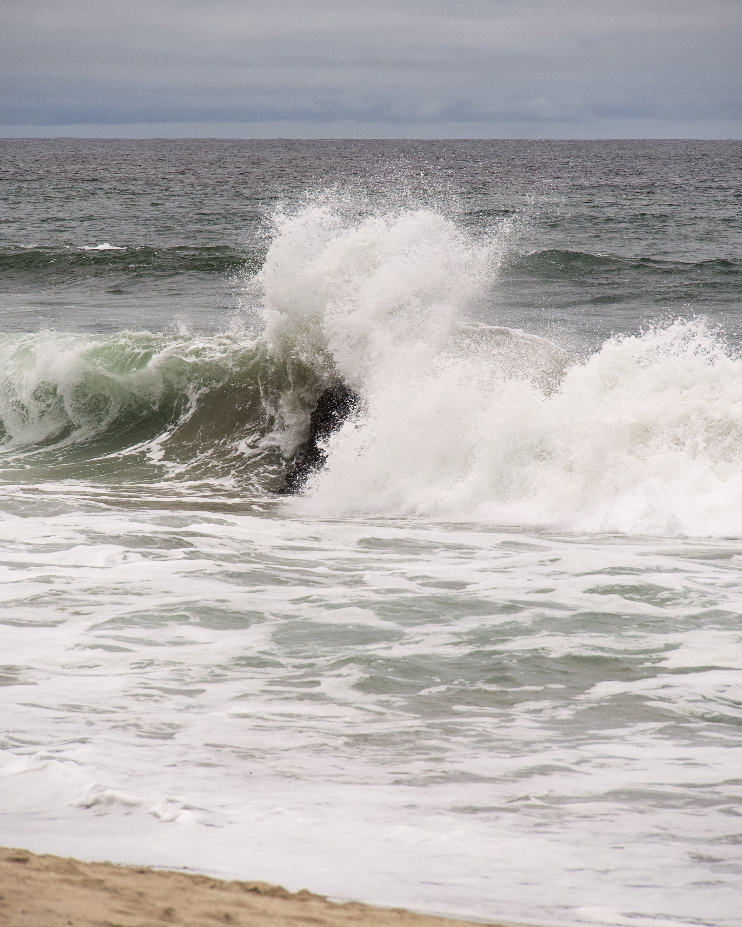 Waves crashing on rocks
