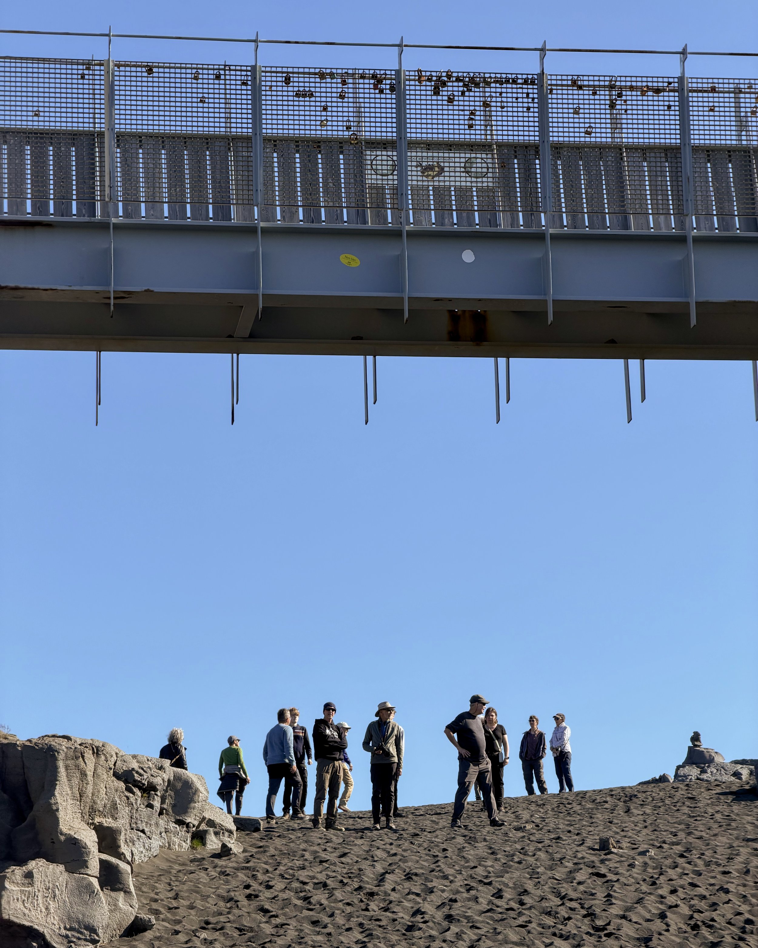 People taking photos of the bridge