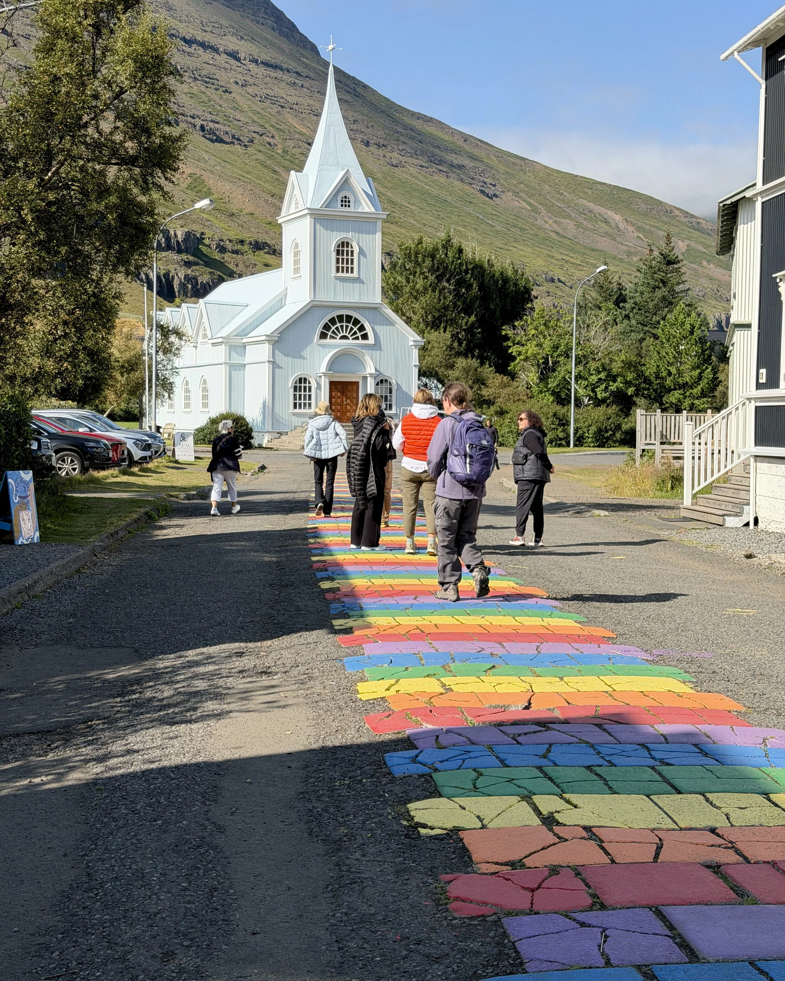 Rainbow path leading to Seyðisfjarðarkirkja