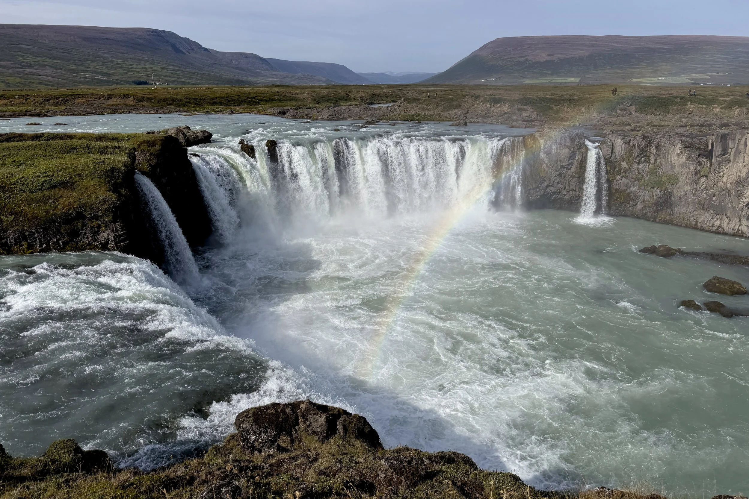 Rainbow through Goðafoss