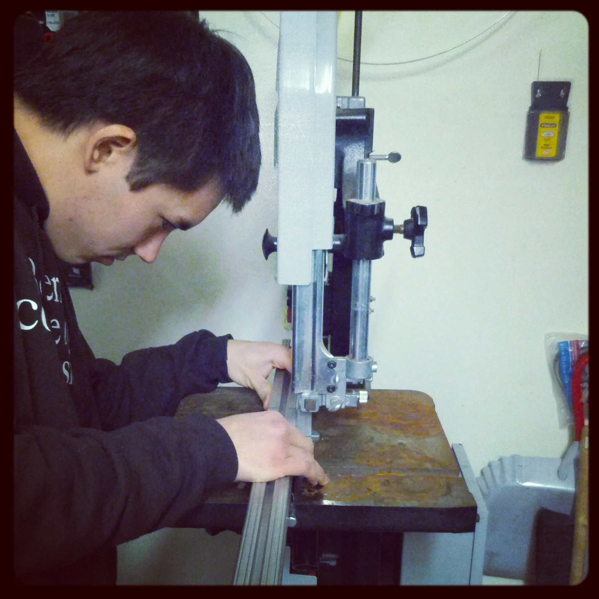 Me cutting a section of 80/20