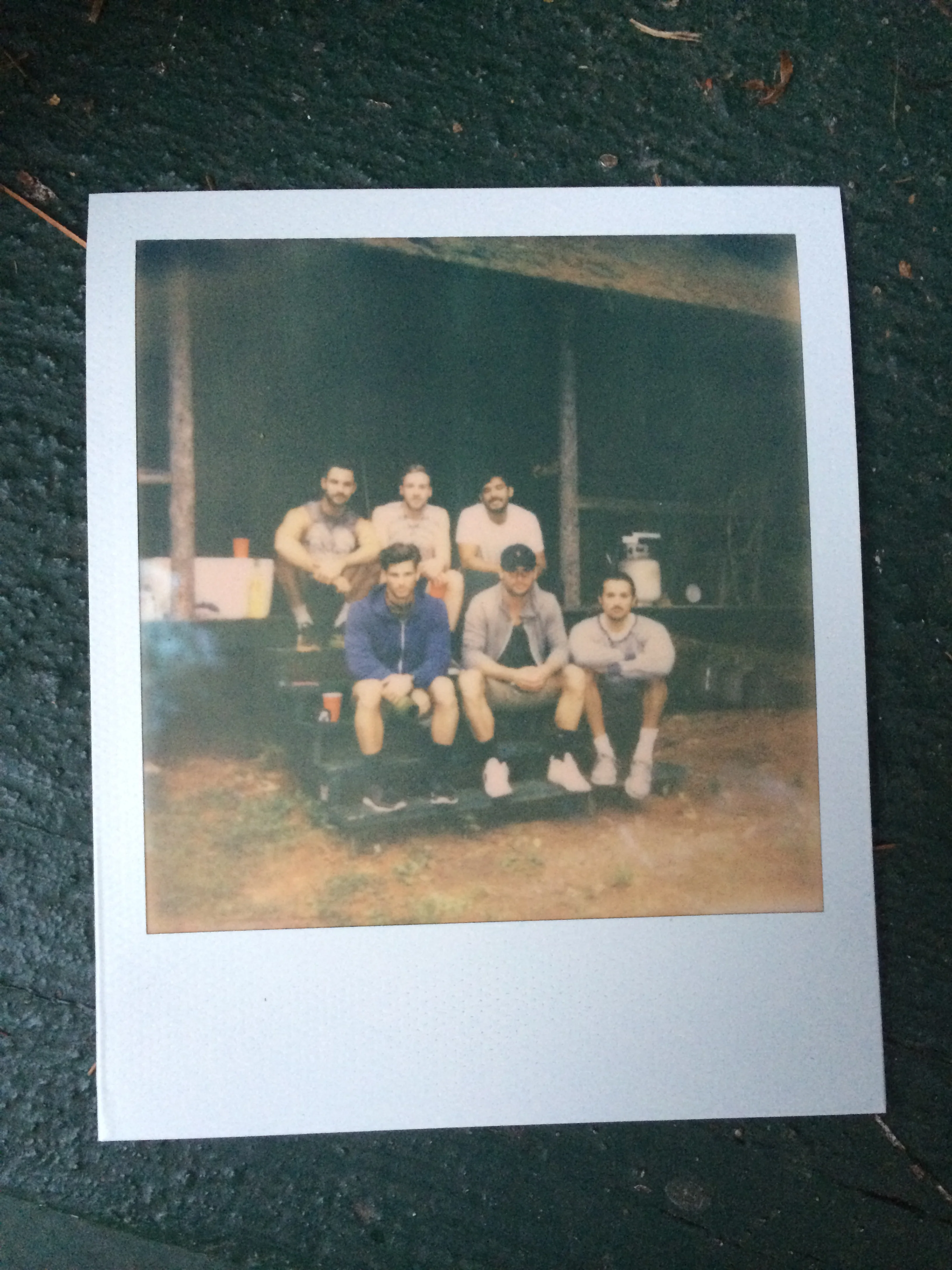 The boys in front of Mr. Philbrook's true Americana hunting cabin.