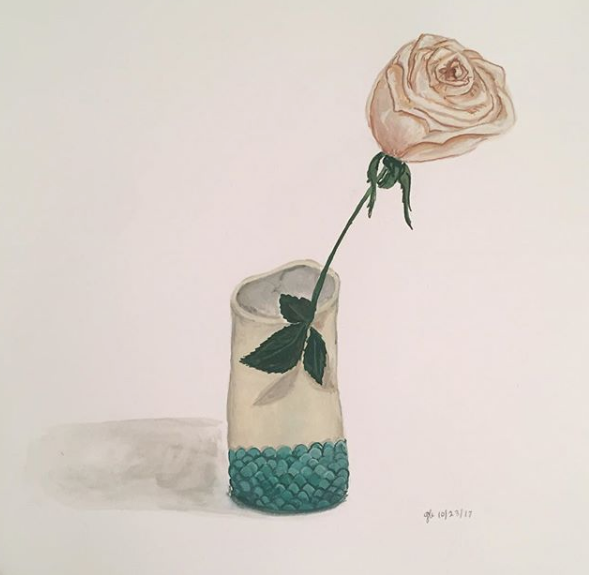 single-rose-in-handmade-vase.png