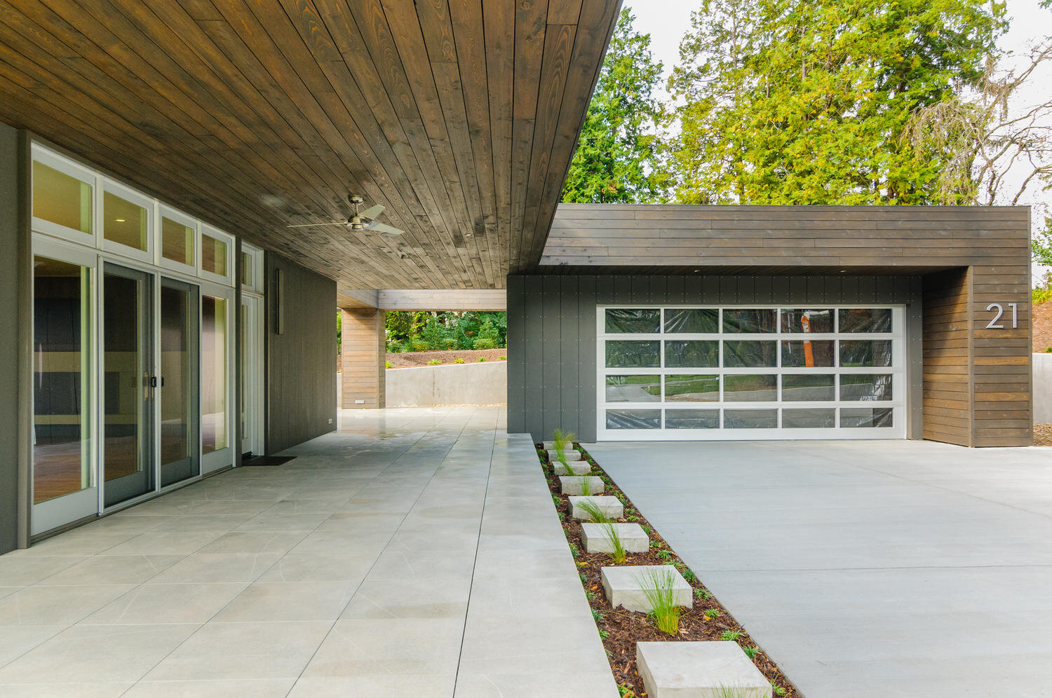 modern aluminum & glass garage door by roost - david way