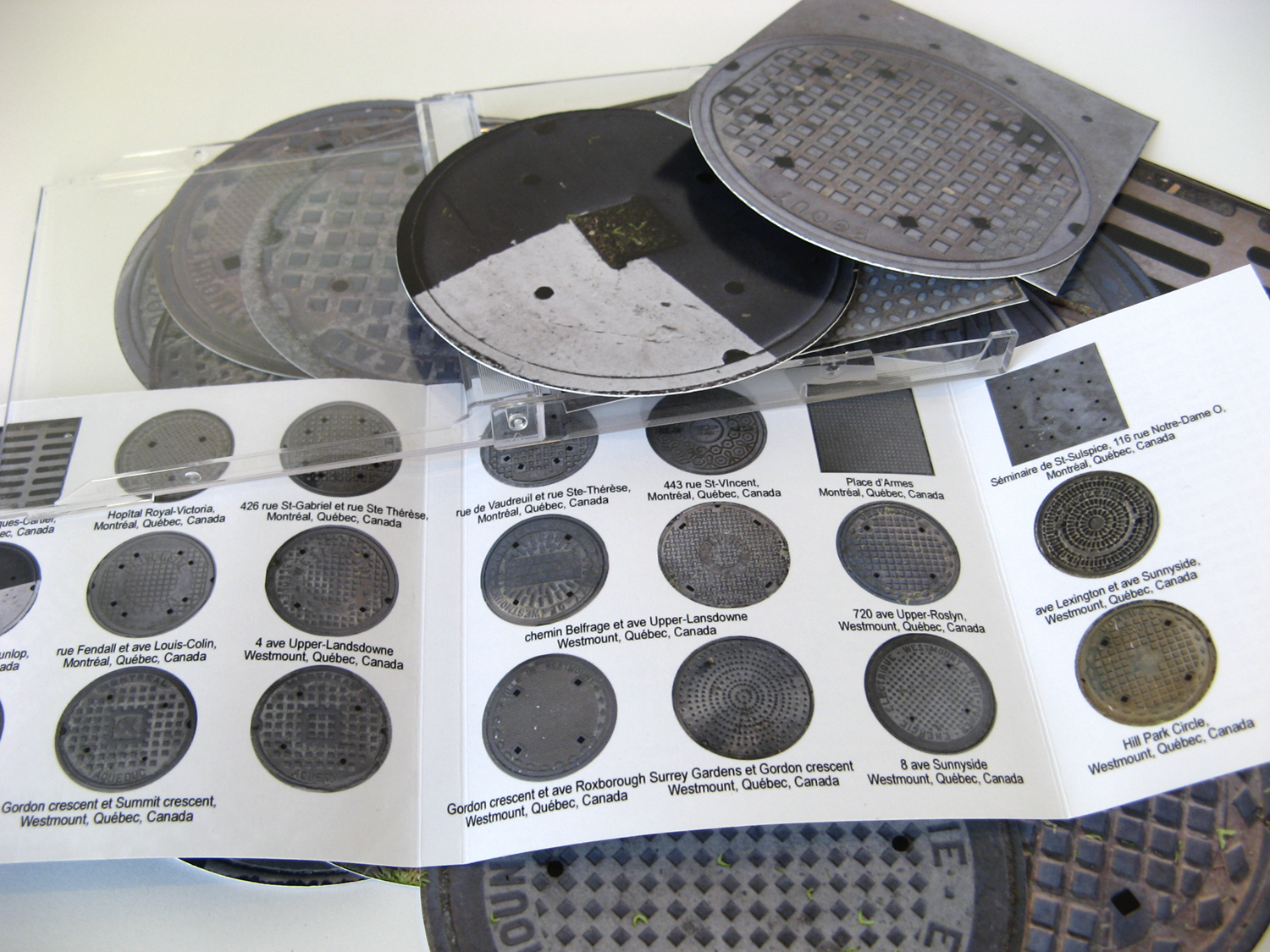 Close up of the insert and manhole covers of the Ville de Québec volume, Vol 3: No 3 