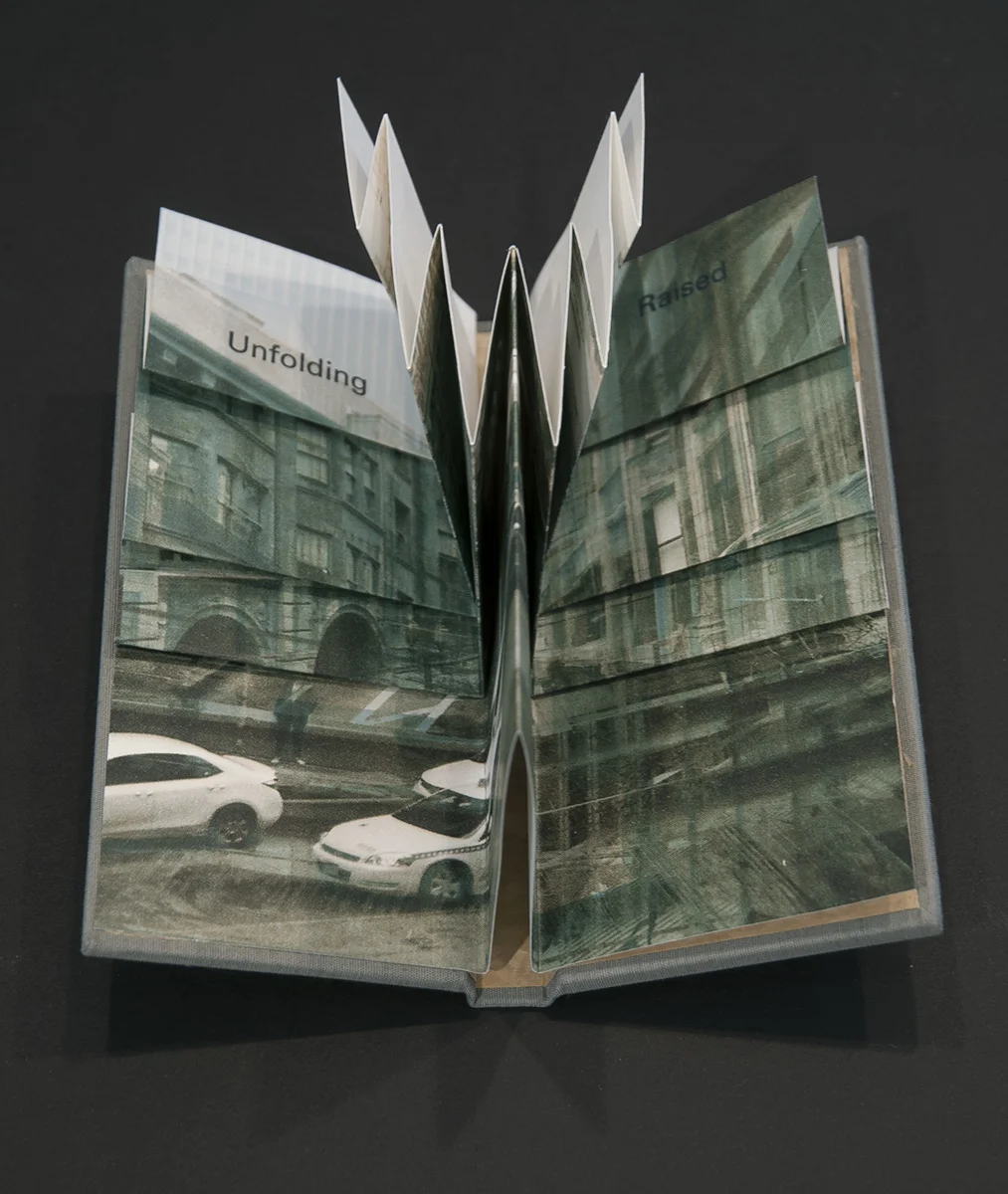 © 2014 Marlene MacCallum, Nine Elevated Views, view of center opening of book, inkjet, lithography and letterpress, 17.3 cm x 16.5 cm