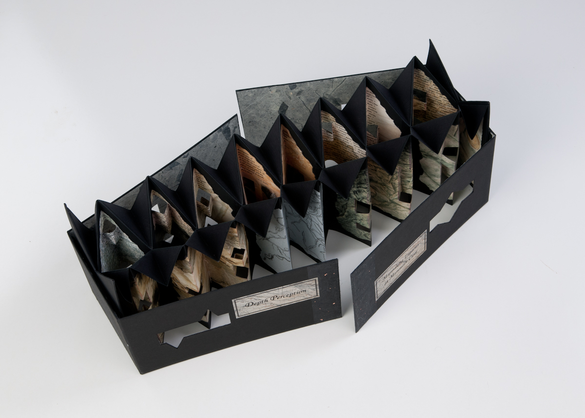 © 2011, photo by Tommy White; Depth Perception: Mapmaking Legacies at Mammoth Cave by Sharon Sharp is spired accordions sewn back-to-back, with fold-down end sections and pop-up features