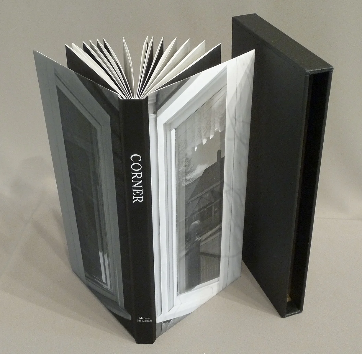 © 2013 M. MacCallum, Corner a handbound accordion book with slipcase, the structure is held closed into a codex form by sewing across the spine into the end pages. 26.1 x 13.2 x 2.4 cm (closed dimension)
