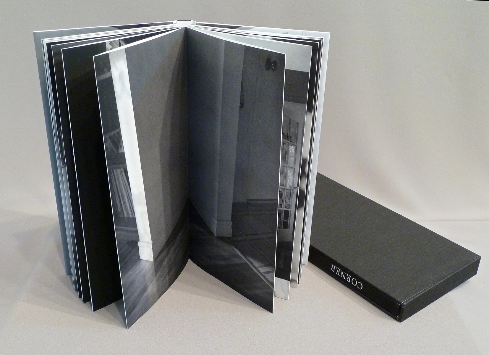 © 2013 M. MacCallum, Corner, front and back end pages slip into the cover pockets, the book block is printed in photogravure on Somerset paper and the cover is inkjet on coated Tyvek