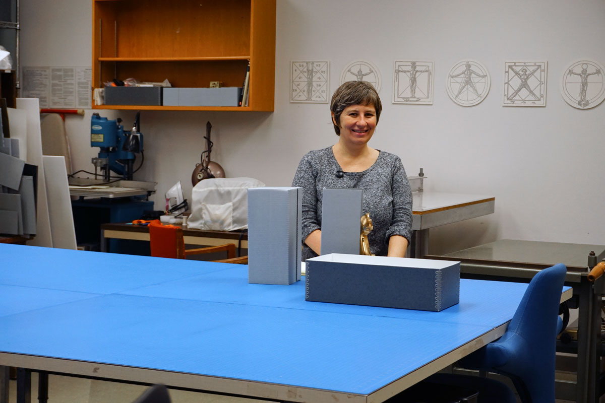 © 2017 Louise Levergneux, Genevieve Pierce in the Preservation Lab working on boxes for a specific collection