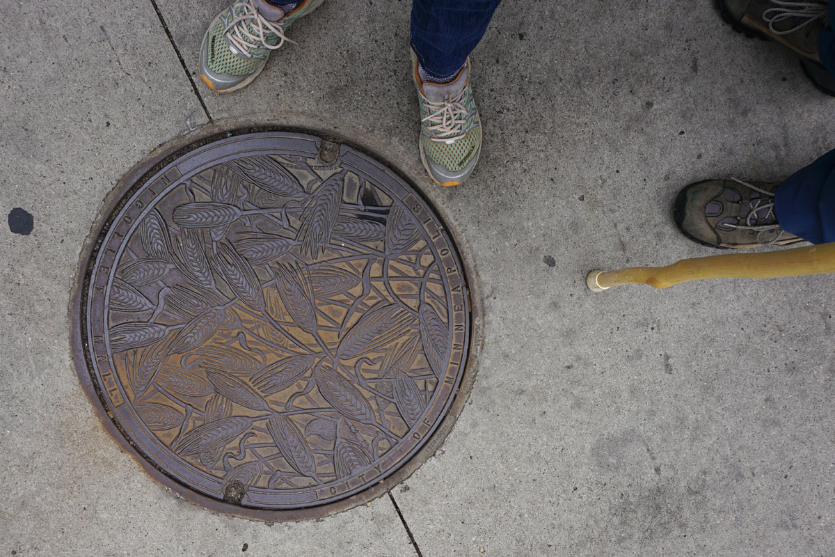 © 2018 Louise Levergneux. Wheat, manhole cover on Nicollet Mall, designed by Kate Burke.