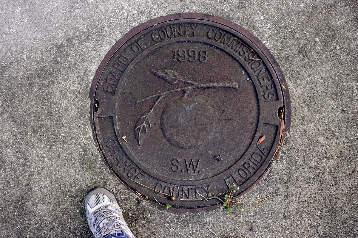 © 2018 Louise Levergneux. Manhole cover in Orlando, Florida