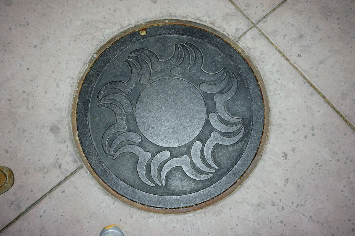 © 2018 Louise Levergneux. Manhole cover in Tucson, Arizona.