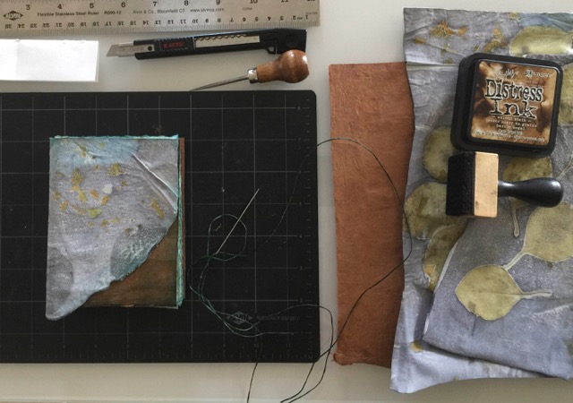 © 2019 Dorothy Simpson Krause. Making a book for her Alaska trip.