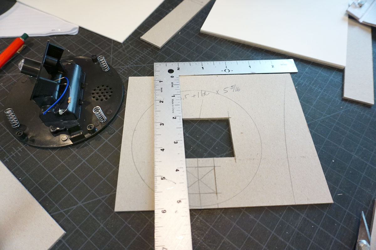 © 2019 Louise Levergneux. Figuring out the binding cut-outs to fit the electronics.