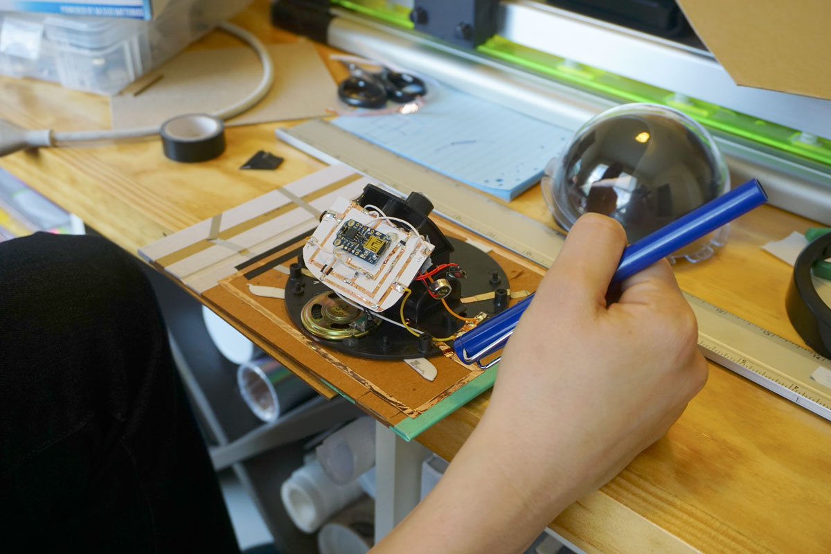 © 2019 Louise Levergneux. Natalie Freed working on the electronics.