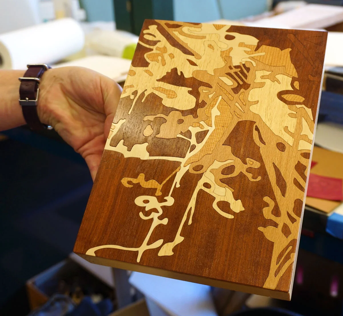 © 2019 Louise Levergneux. Sarah’s art work using laser cut marquetry in wood veneer.