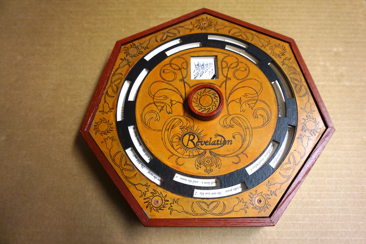 © 2019 Louise Levergneux. Revelation by Thomas Parker Williams, edition of 5; seven sided wood case, laser-cut face plate, copper panels with patina and laser transfer design; 10 printed laser-cut (by FreeFall Laser); panels with mechanical parts for actuation.