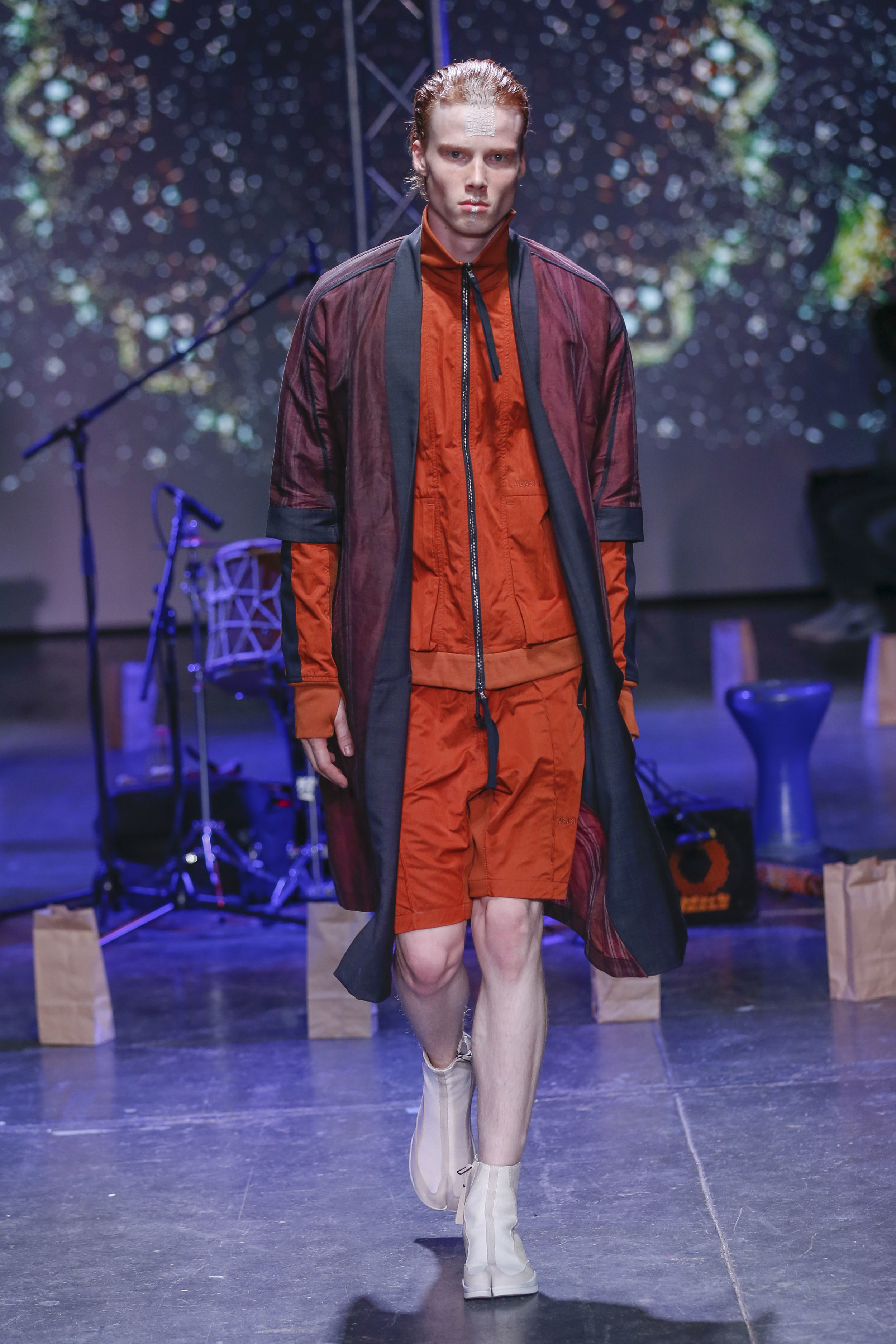  LOOK 18   ARC Noragi  / Maroon Stripe   ARC Track Jacket  / Orange   ARC Atlas Short  / Orange   ARC Apollo Tabi Boot  