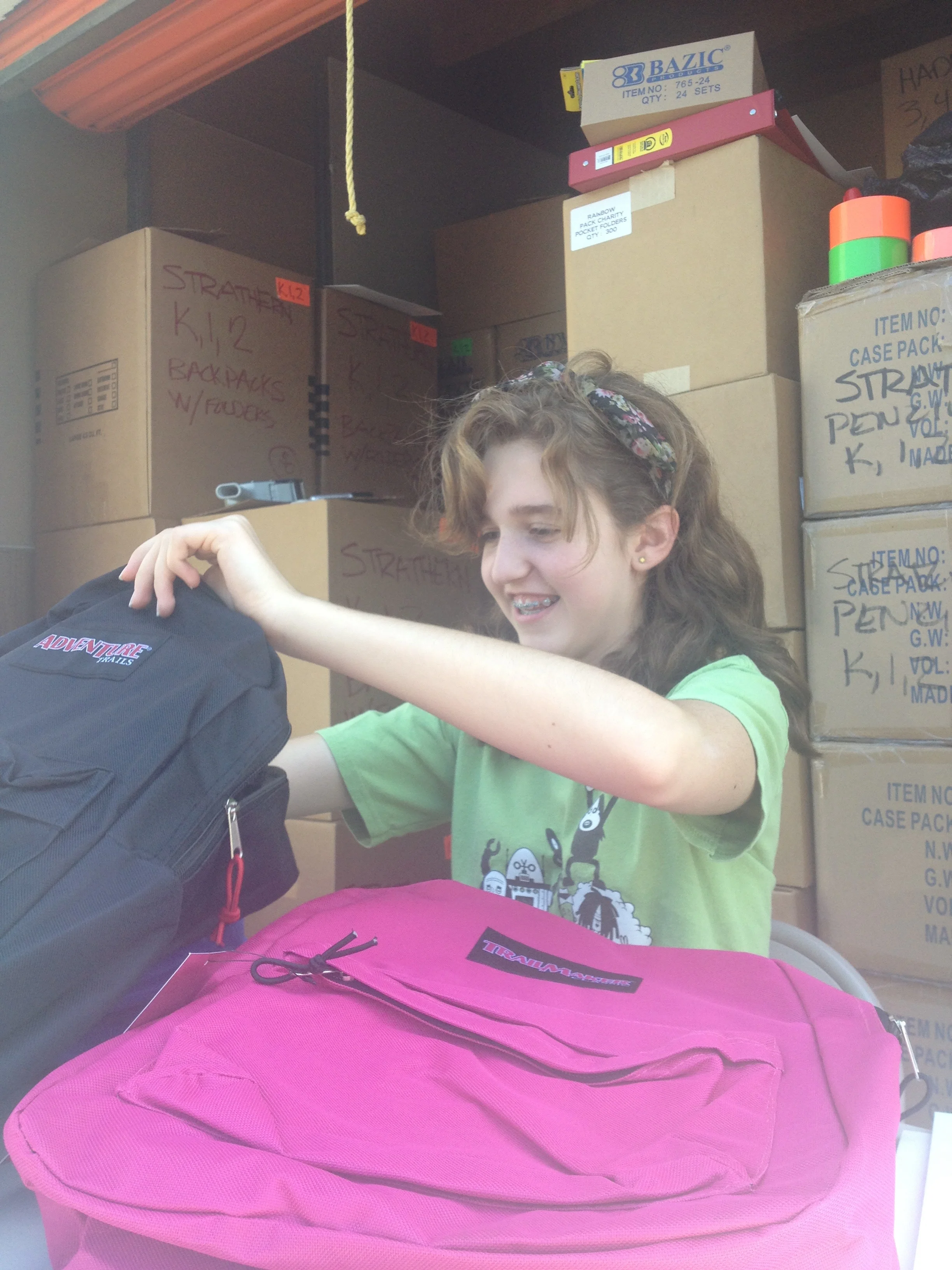 Getting ready for the Rainbow Pack Back to School Fair - 2014