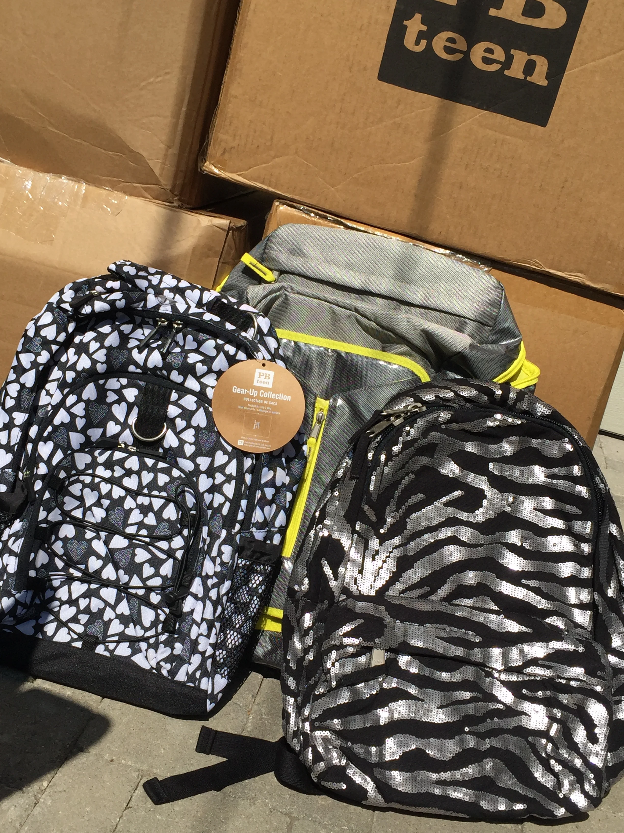 PB teen donated 100 backpacks !