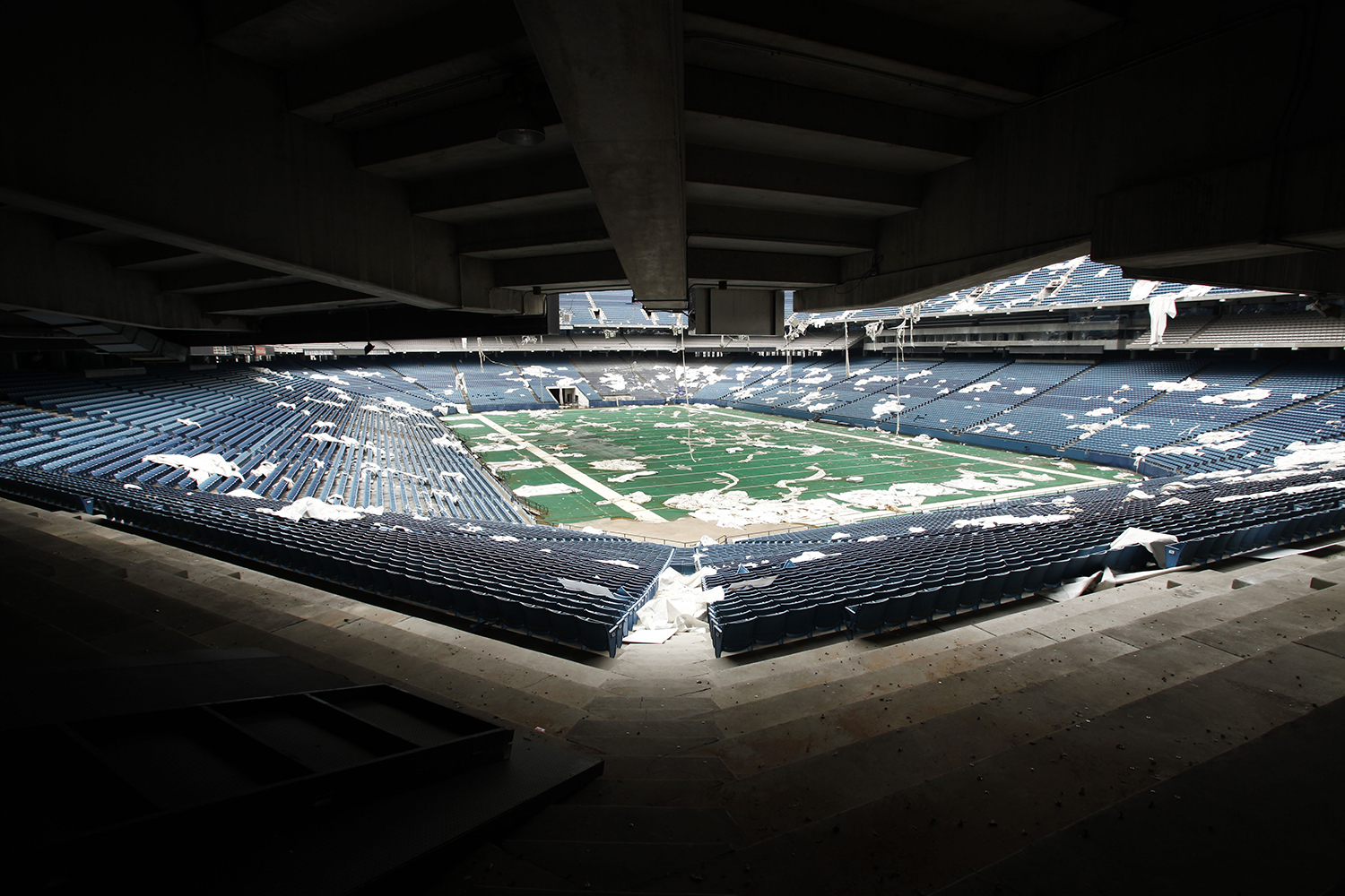 Pieces of the roof litter the stands and playing field at the Pontiac Silverdome on Friday, May 9, 2014 in Pontiac. Tim Galloway for Al Jazeera America