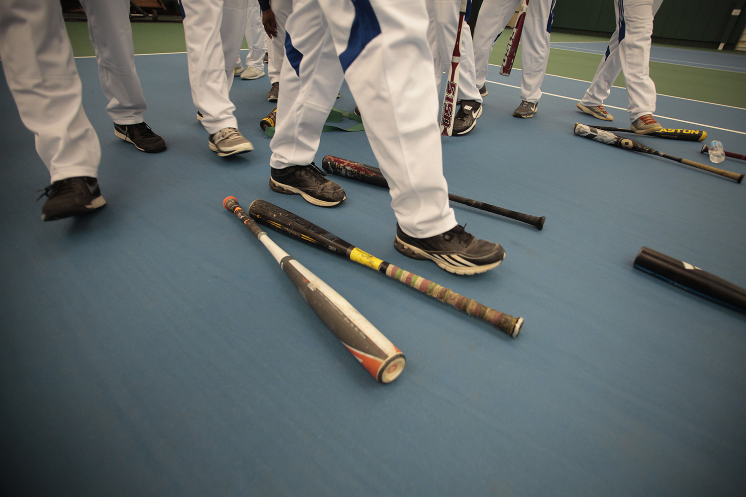 Participants walk over to reclaim their bats before the Muscle Milk Heavy Hitter Home Run Derby on Thur., July 17, 2014 at Wayne State University in Detroit. Tim Galloway/Special for DFP