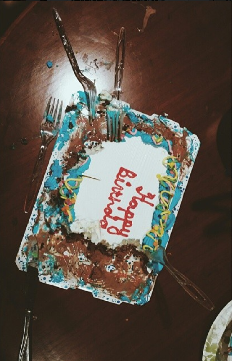 Katherine's birthday cake being shared (taken via Rob's instagram )