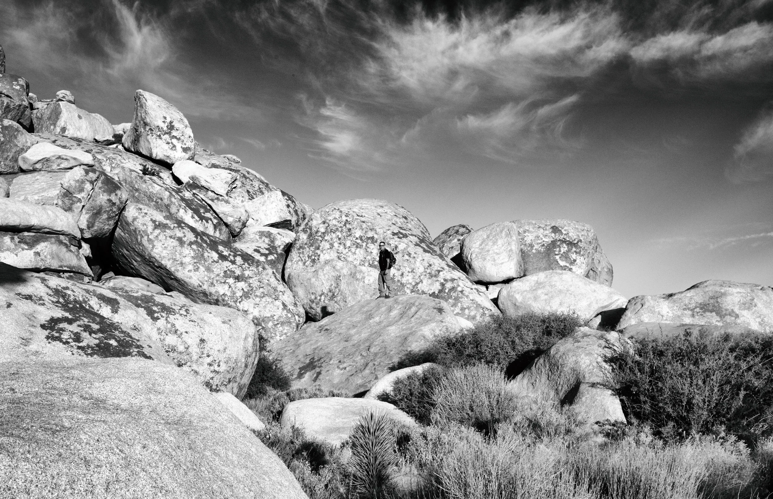 My husband bouldering at Cap Rock.