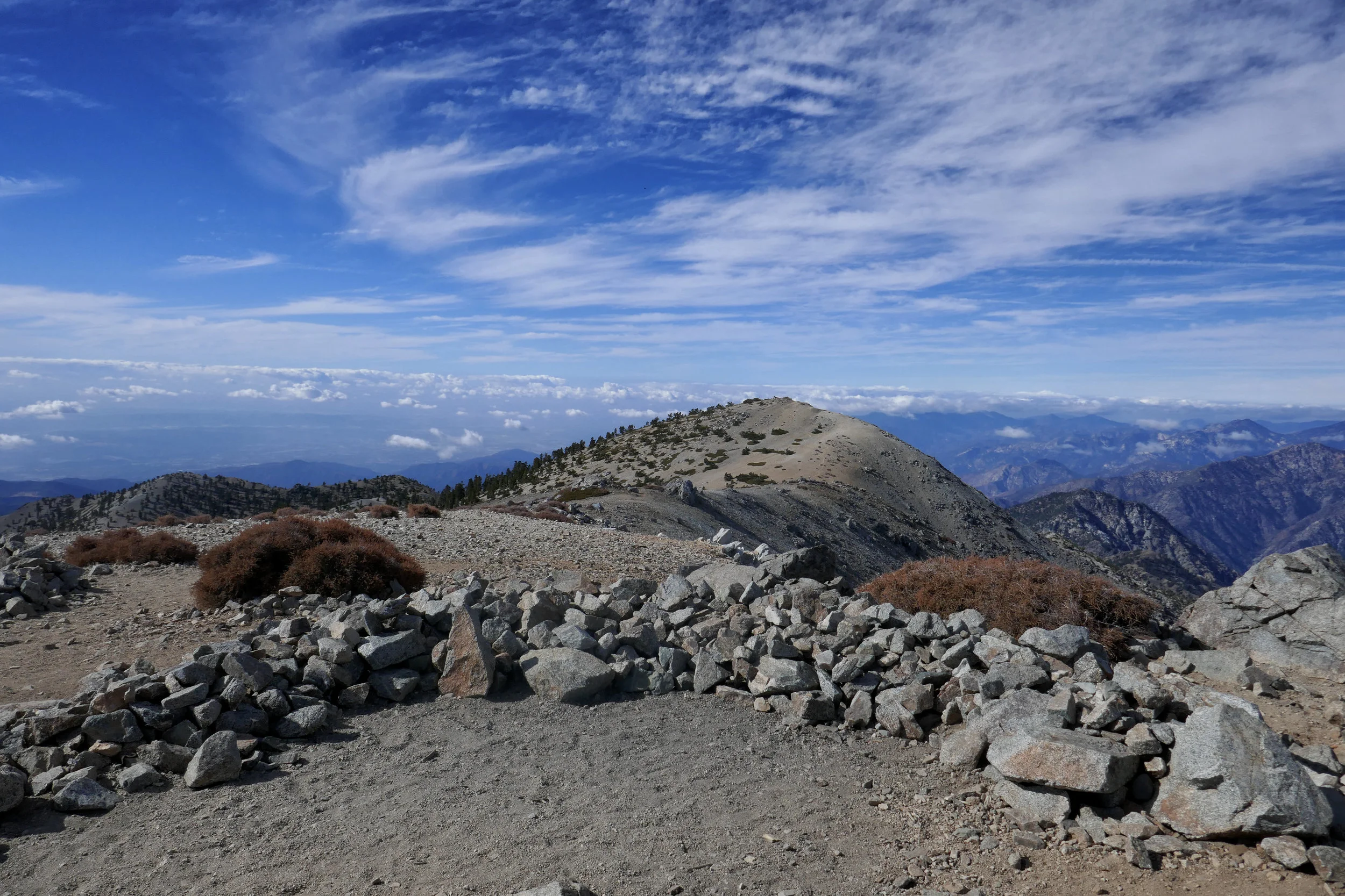 On top of Mount Baldy! Spectacular views! There were 45 MPH winds today. I took my gloves off to take a few photos. It was hard to stand with the gusts. 