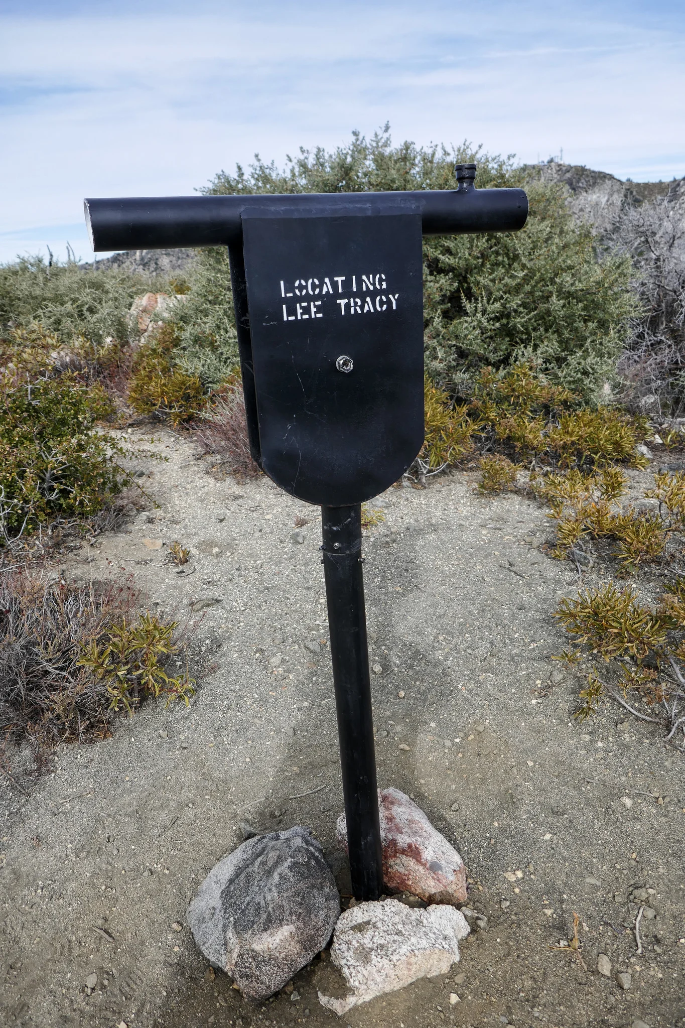 Viewing tube dedicated to Lee Tracy. When you look through it, you'll see his photo. This gentleman was a hiker who led people up here on Wednesday evening hikes. He died tragically this past year in a hiking accident.