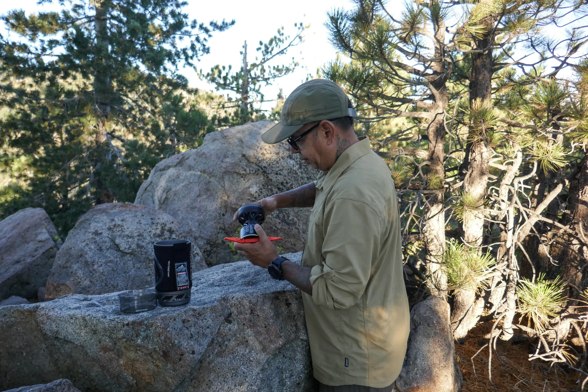 Time for breakfast. I had asked my husband for a Jetboil for my upcoming birthday. It is the first item in a lot of backpacking gear we'll need to make the transition from day hikers to backpackers. We took it for a test run this morning, and it did not disappoint. 