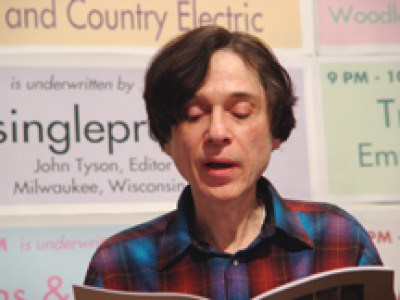 Jeff Poniewaz in mid-reading.