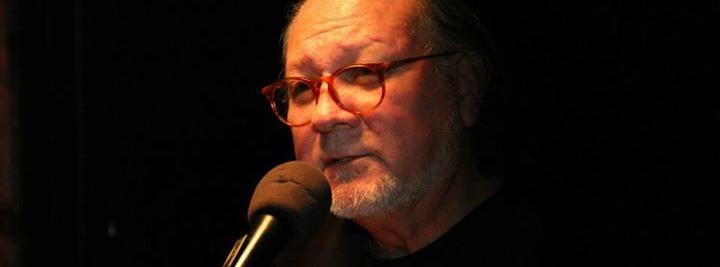 Gregorio reading with intensity.