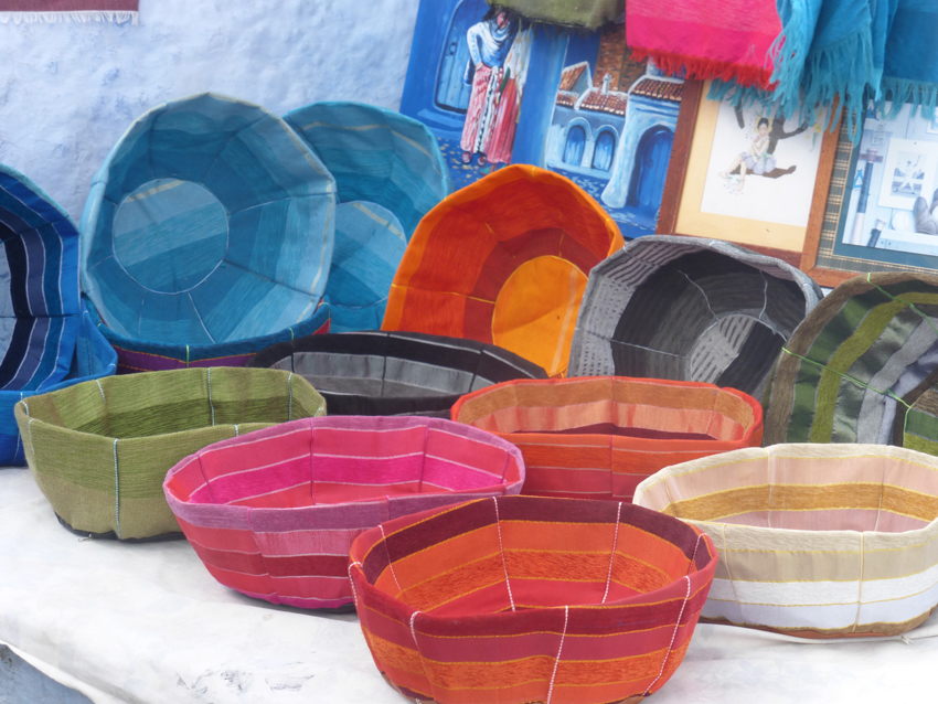 These are what we decided to call "poofs" (not sure what the Arabic word is) for sitting on...you just stuff these with fabric or rolls of clothes, turn them over and voila! 