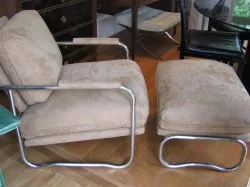Contemporary Chrome & Ultrasuede Chai r - $1400 Height: 32" Width: 27" Depth: 31"