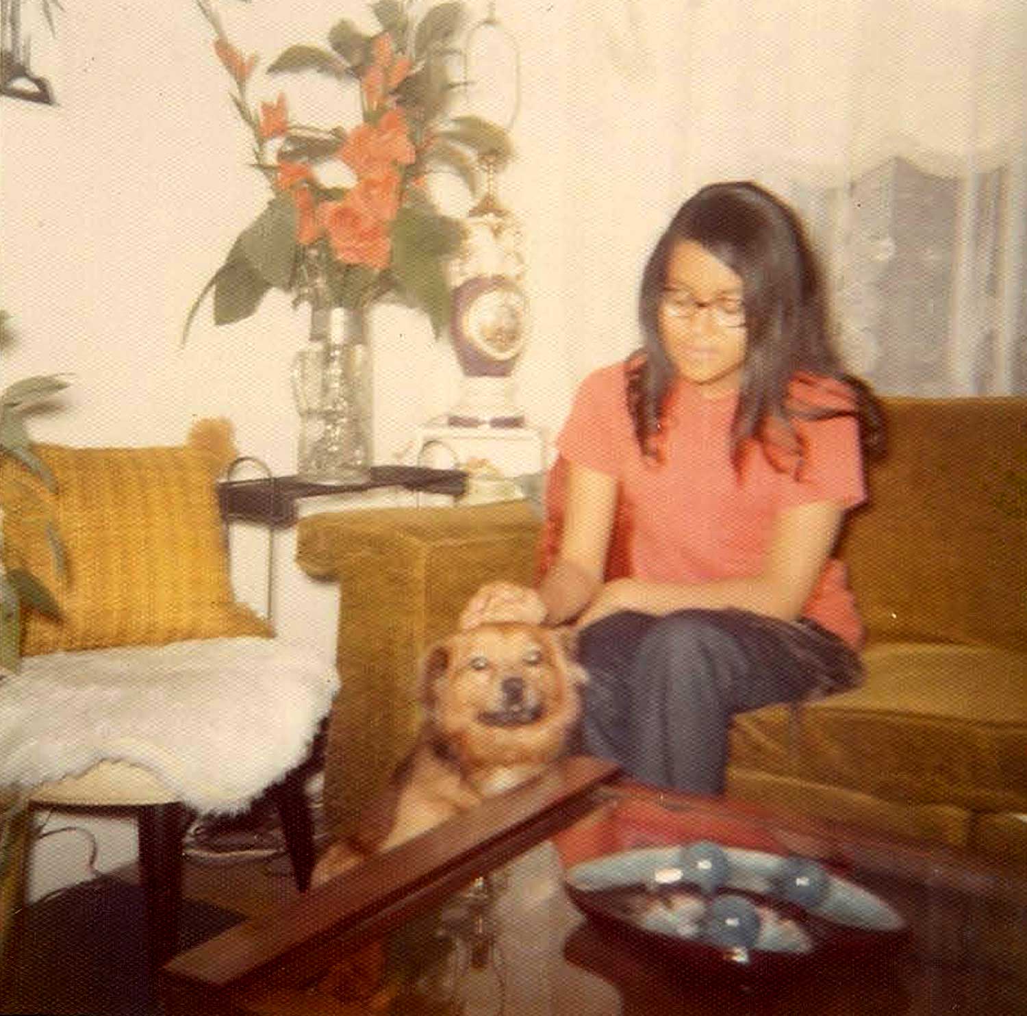   Karen petting a dog. 1970.&nbsp;  Photo courtesy Karen Smith.  