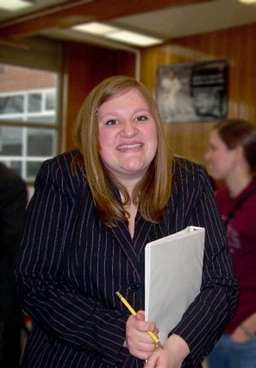 Bethany in her pink pinstripe suit at her final tournament. Photo by Katy Allen-Schmidt.