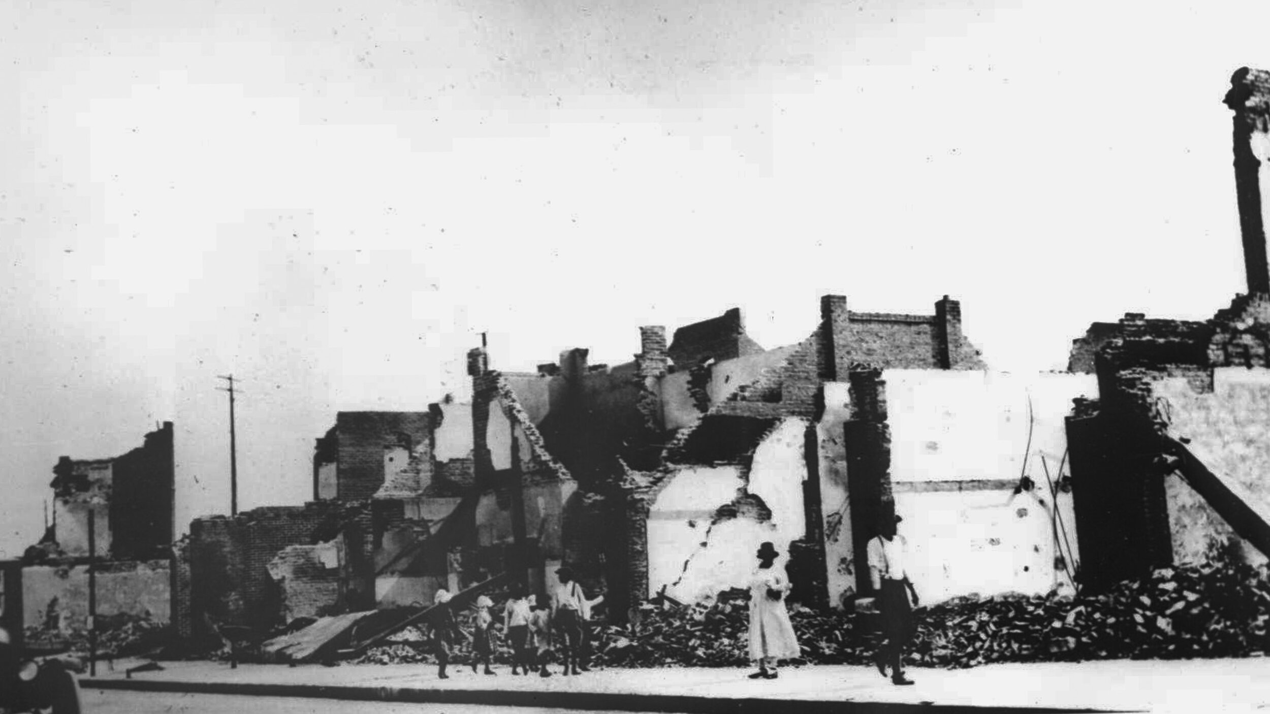   Rubble and brick walls after the fires subsided after the Tulsa Race Riot . Used with permission from the  Oklahoma Historical Society  