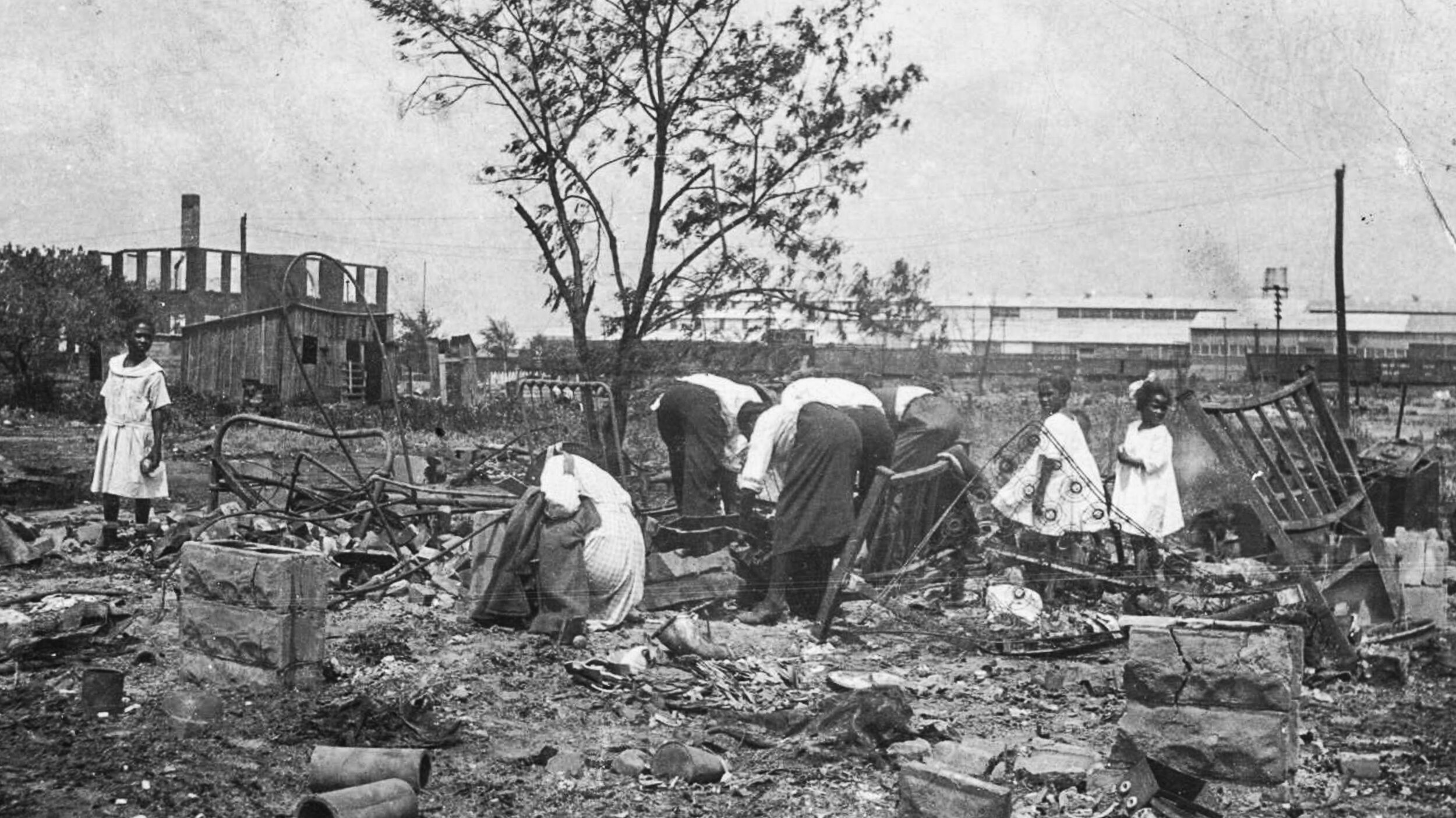   People searching through rubble after the Tulsa Race Riot . Used with permission from the  Oklahoma Historical Society  