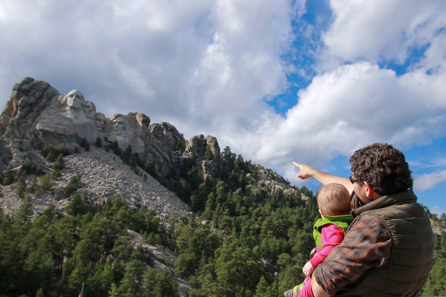 Showing my kiddo the sites on one of her first trips to the Black Hills several years ago.