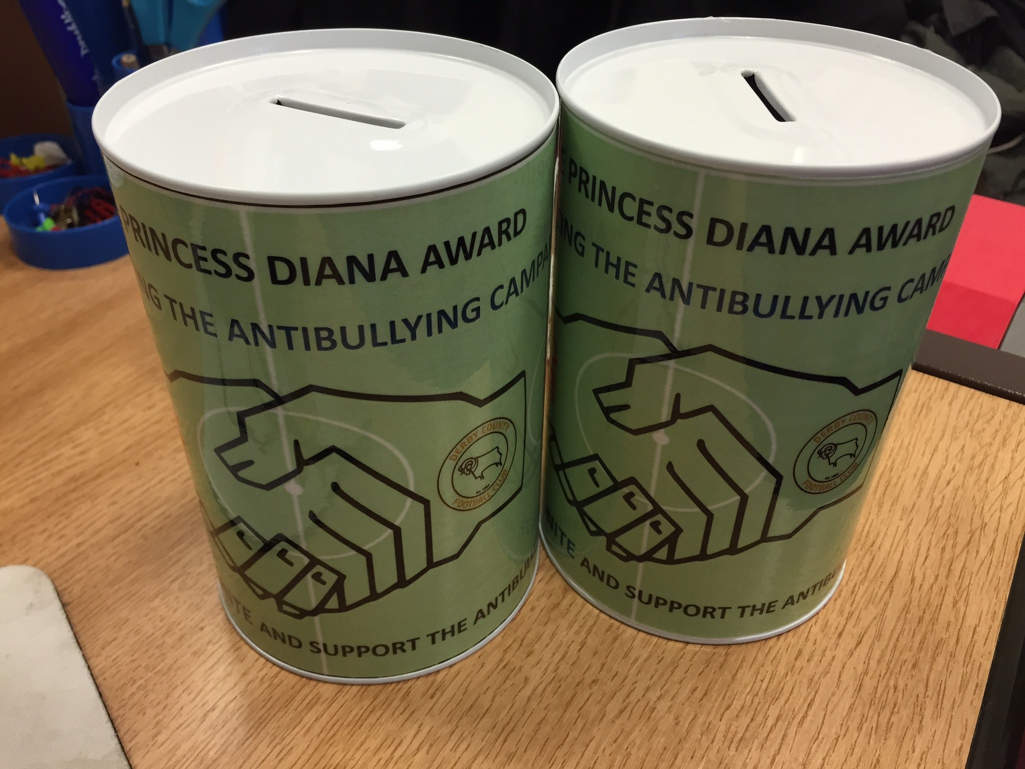Charity tin designed by Alferton Arts College
