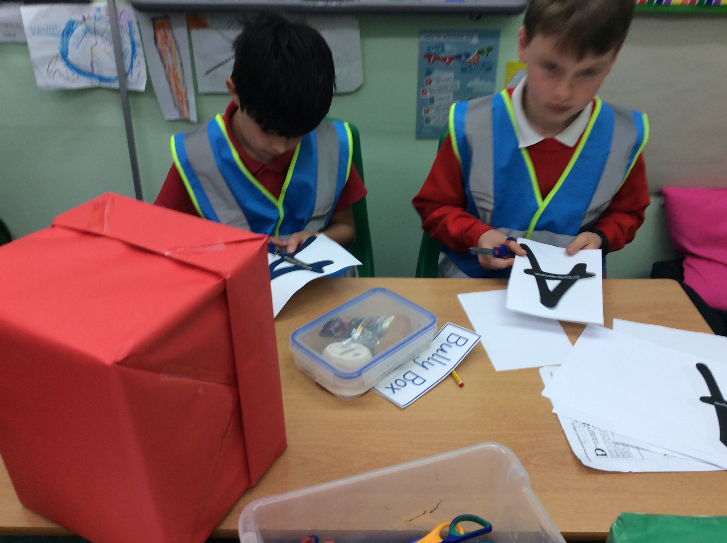 Anti-Bullying Ambassadors making their Bully & Sorry Boxes and wearing their blue hi-vis jackets