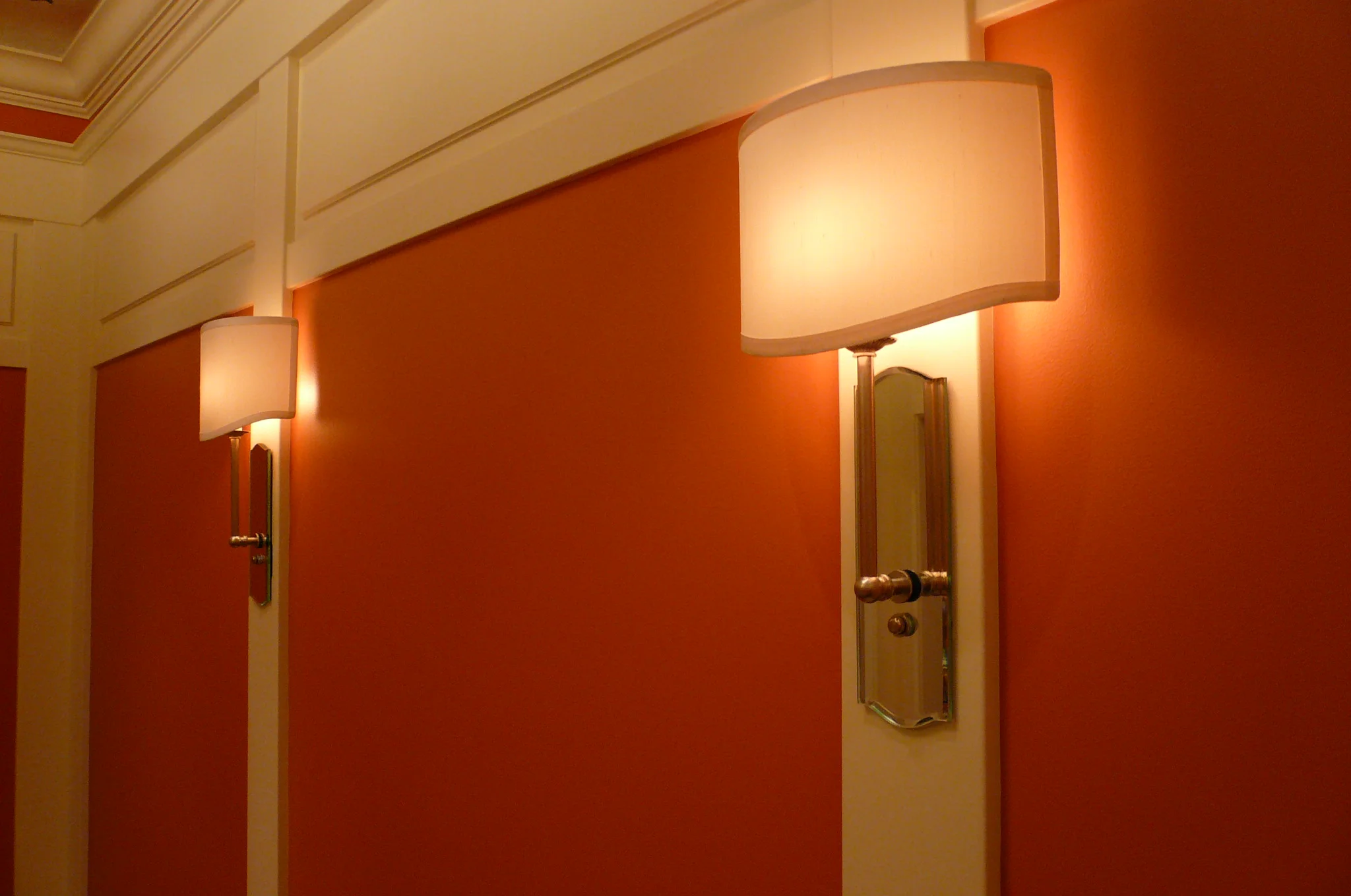 Beveled mirrors with cream silk shields