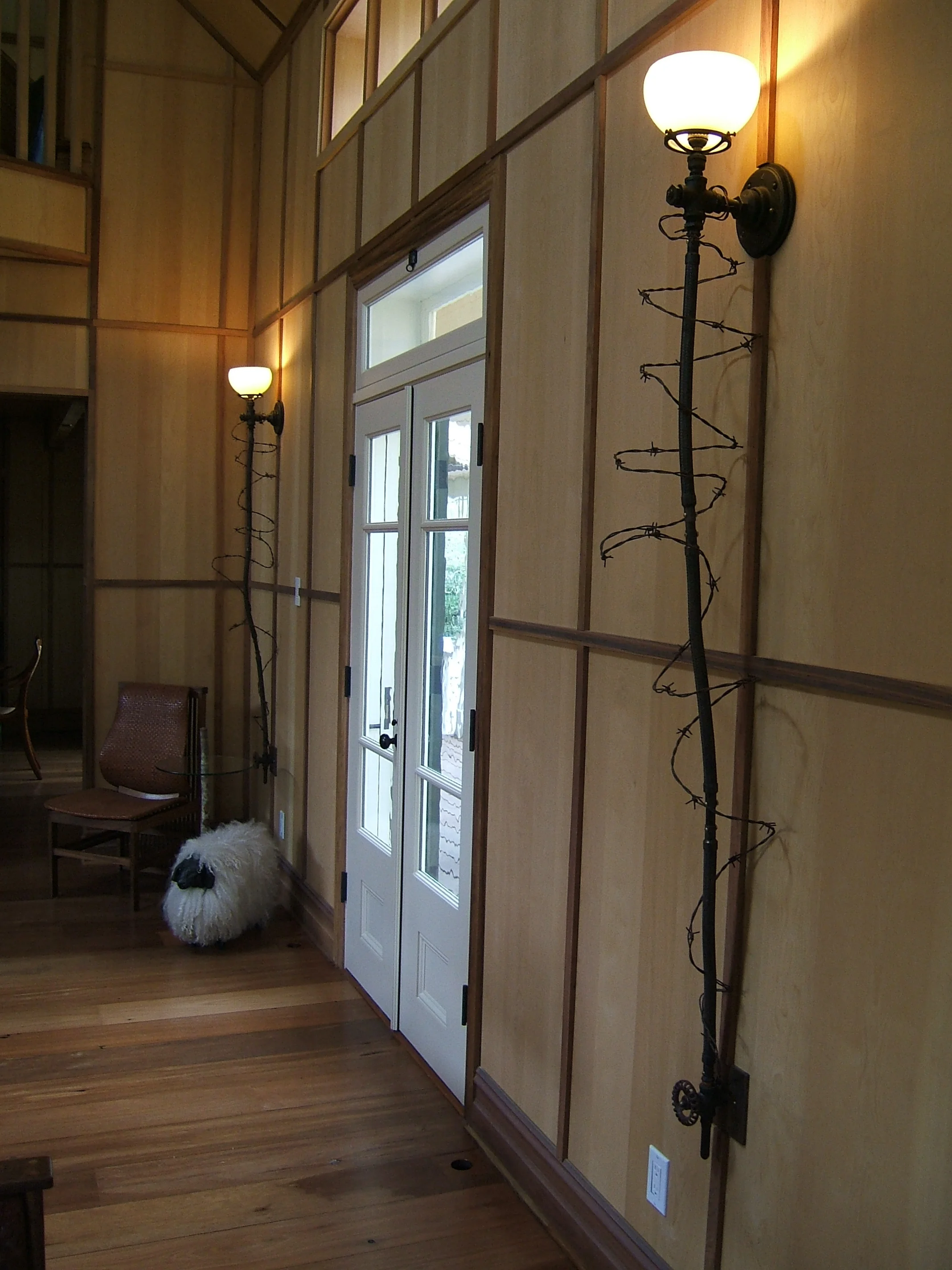 Barbed wire wrapped torches in Sonoma living room