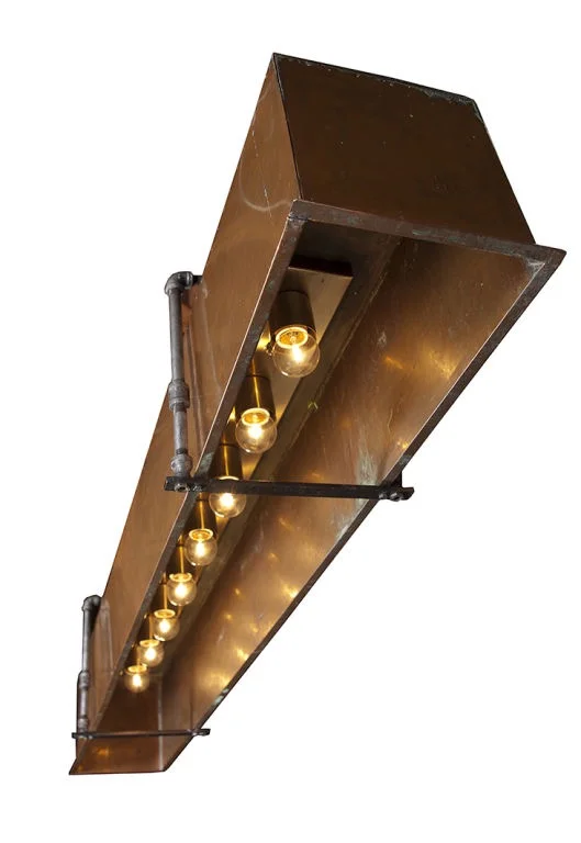 Long copper pendant with 8 nested lamps
