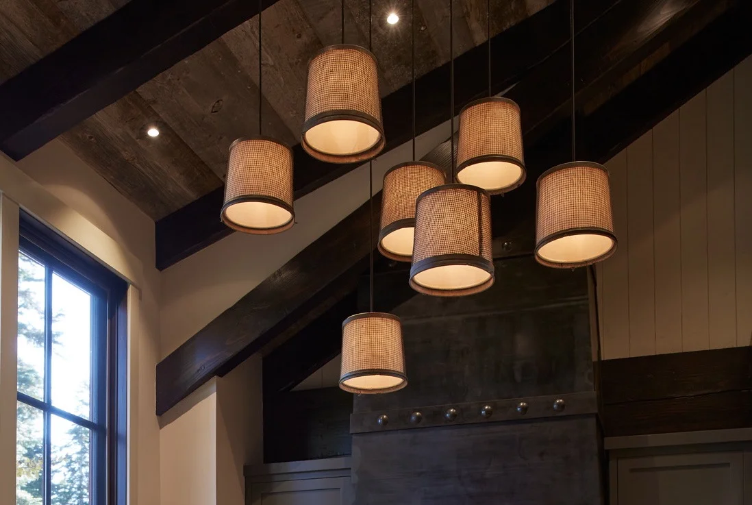 Linen pendants with blackened steel mesh shades/Artistic Designs for Living