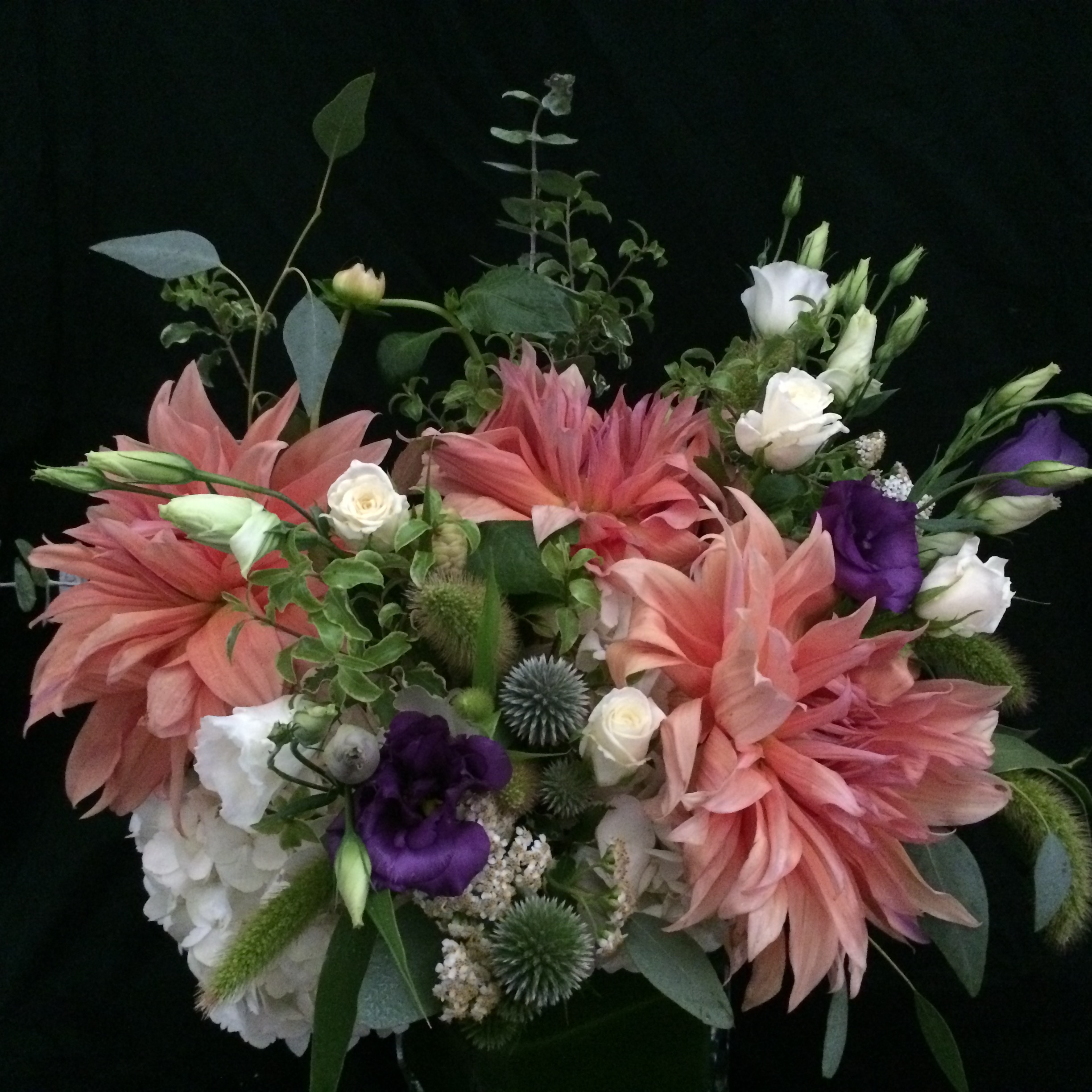 large coral dahlia floral arrangement