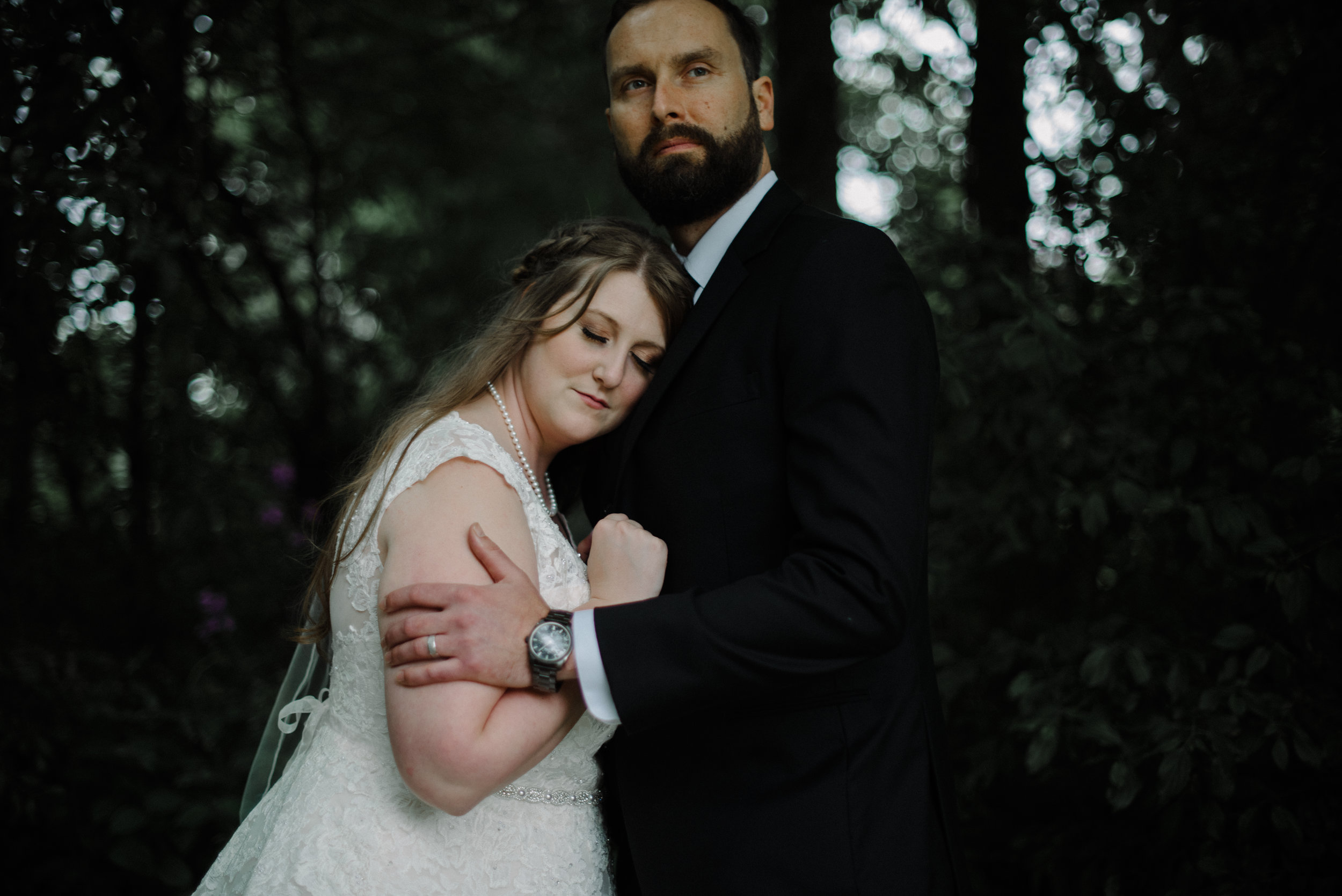 husband and wifte embrace wedding photography.jpg